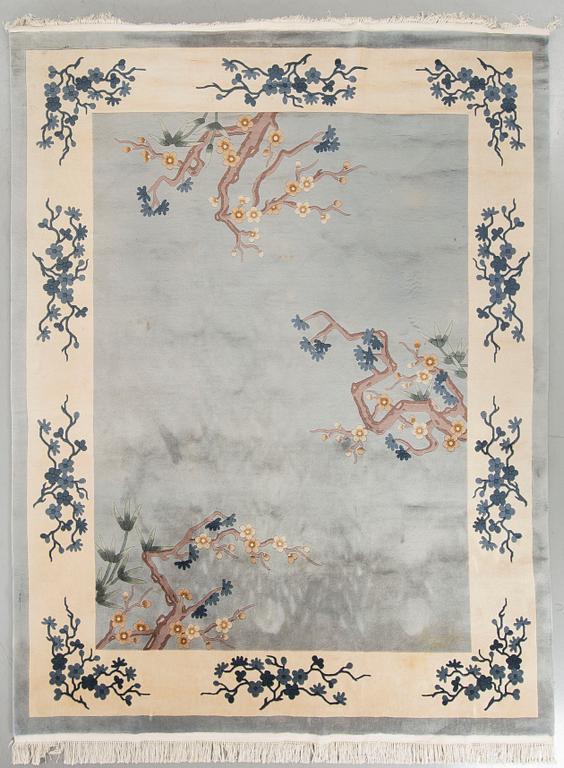 A CHINA RUG, 304X240 CM.