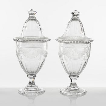 A pair of Gustavian style lidded glass vases, circa 1900.