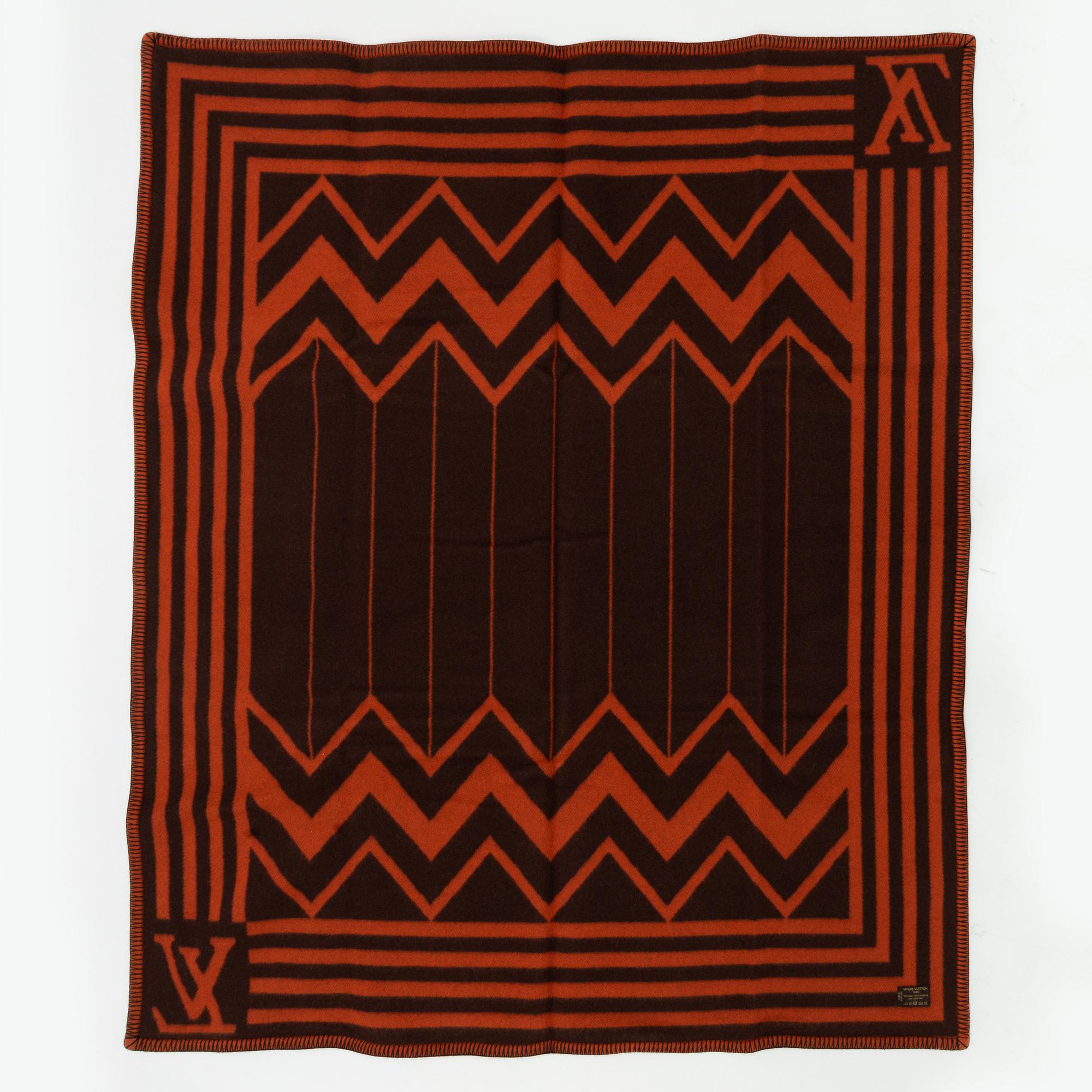 Louis Vuitton, a wool blanket with leather harness, special order 2003.