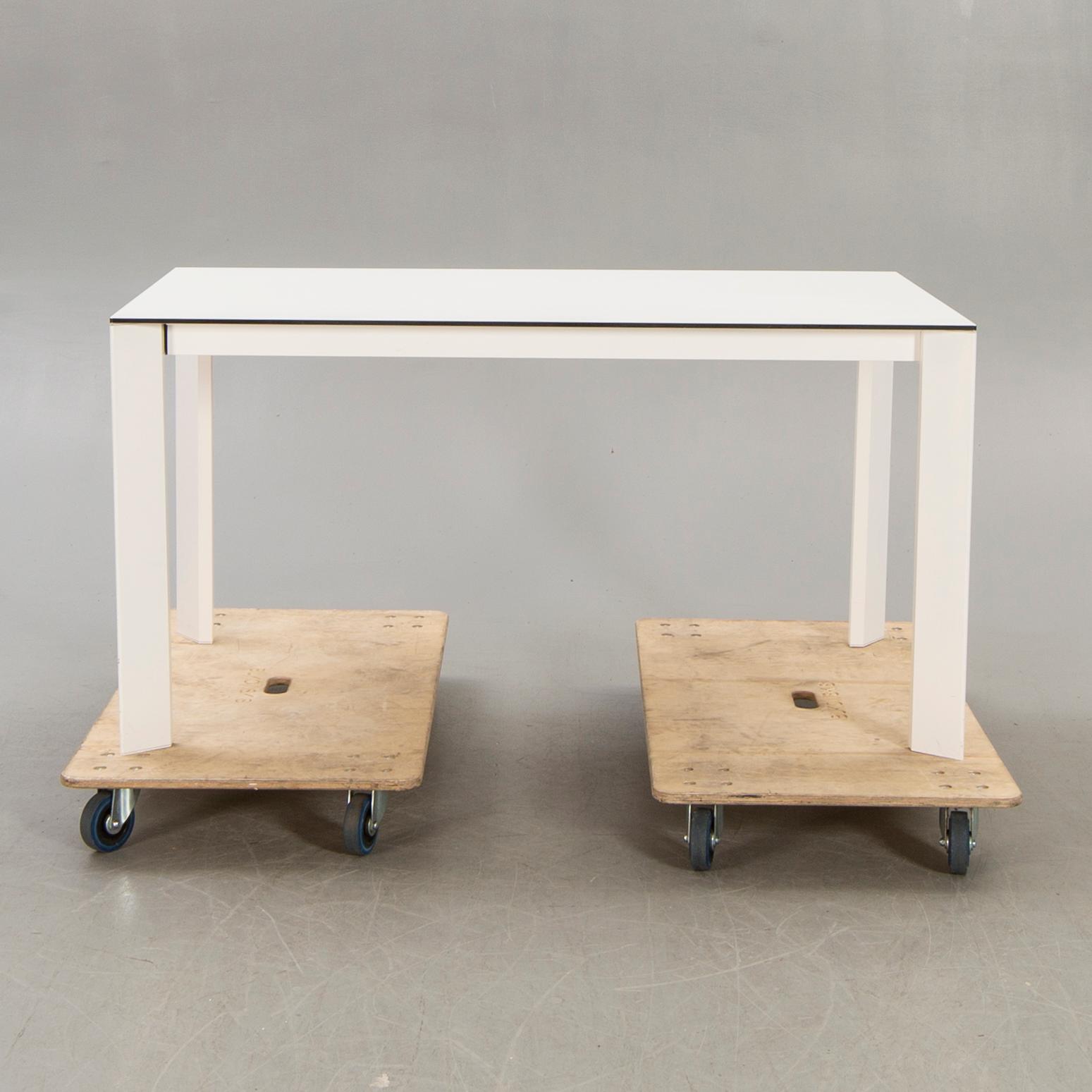 Caronni & Bonanomi, a "Every + Grid" dining table for Desalto 21st century.