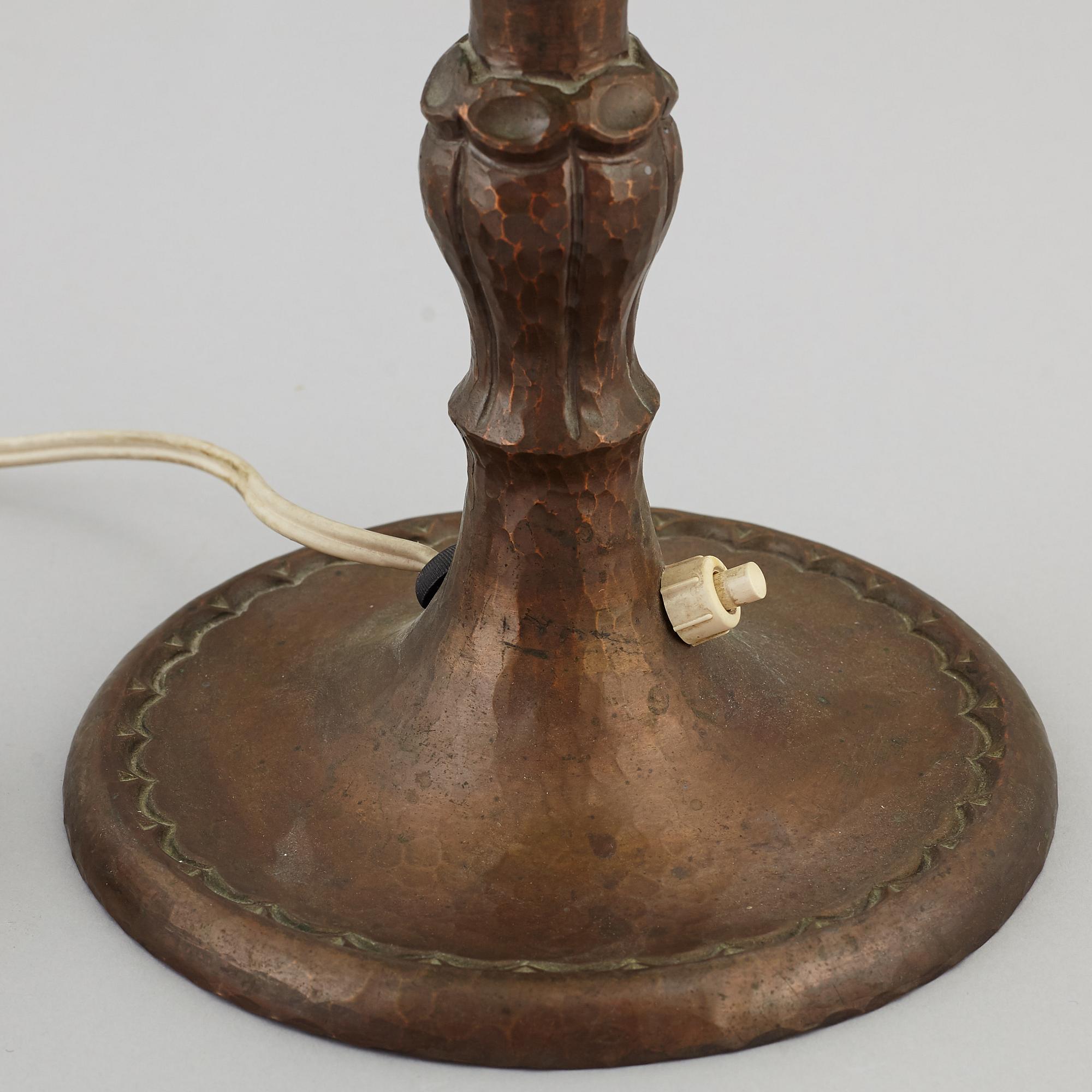 An copper table light, first half of the 20th century.