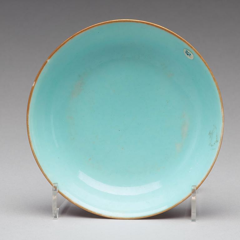 A turqoise ground and pink sgrafitto dish, Qing dynasty with Qianlong mark.