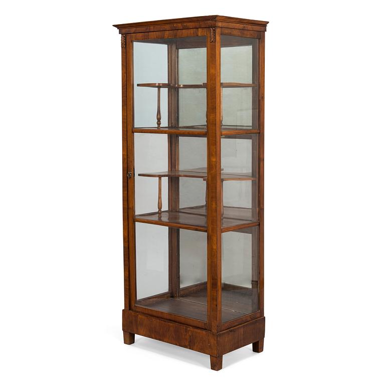 A mid-19th-century vitrine cabinet, possibly from the Baltics.