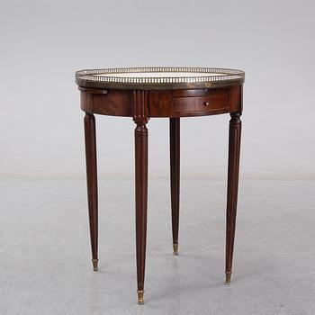 A Louis XVI style marble top mahognay table, circa 1900.