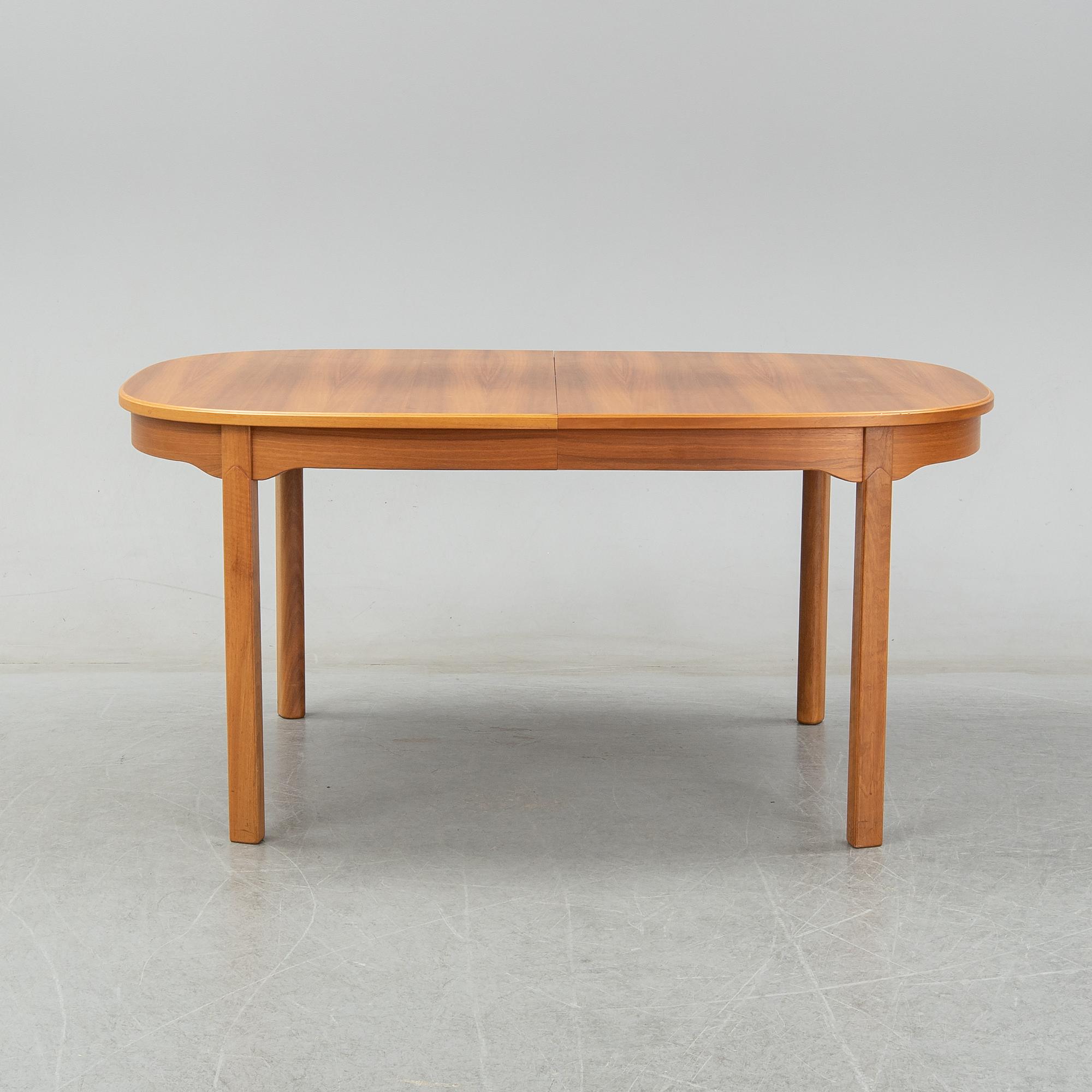 An 'Ambassador' dining table by Carl Malmsten, Åfors.