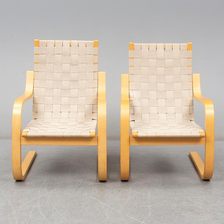 ALVAR AALTO, Pair of model '406' armchairs for Artek, late 20th century.