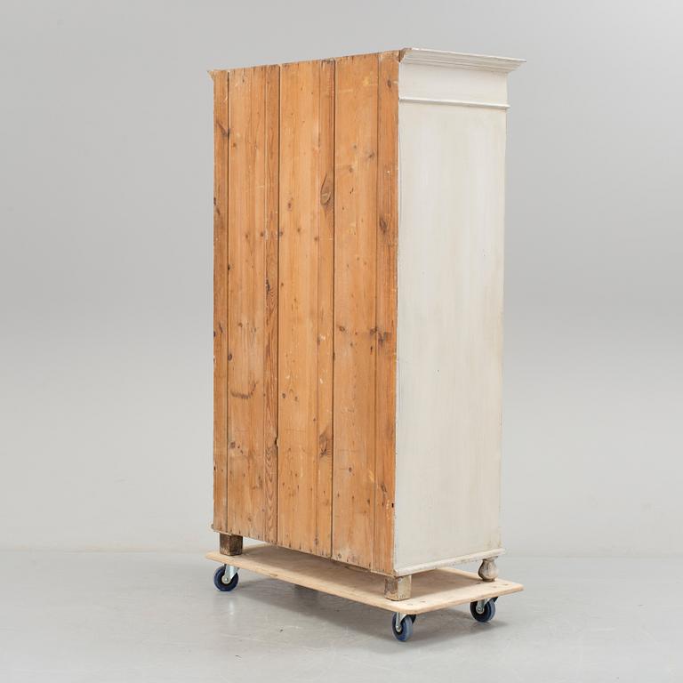 A wardrobe, circa 1900.