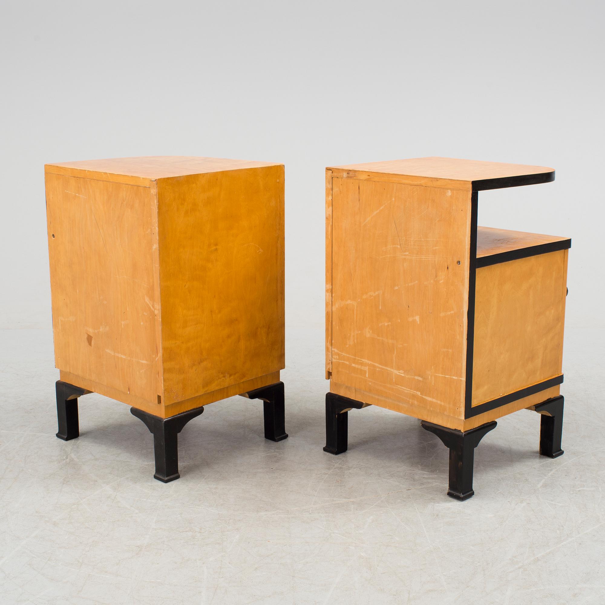 A pair of art déco bedside tables.