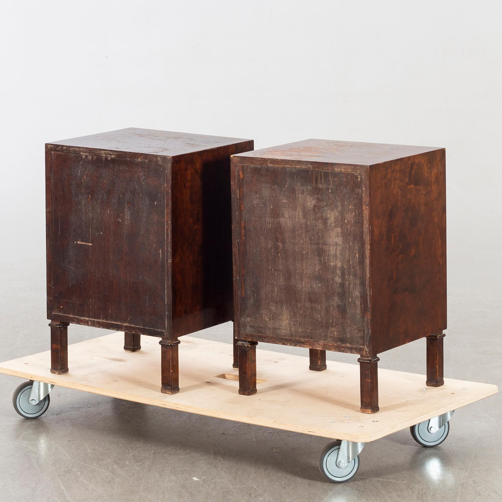 A pair of 1930/40:s Axel Larsson for SMF (Svenska Möbel Fabrikerna) Bodafors night stands.