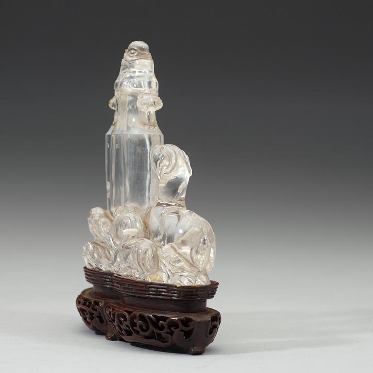 A rock crystal figural group with a vase and cover, presumably late Qing dynasty (1644-1912).