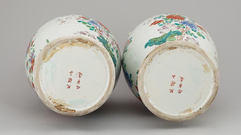 A pair of early 20th century large Japanese urns.