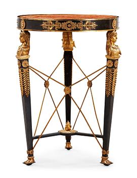 1377. An Empire style table late 19th century table.