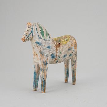 A painted Swedish wooden horse from the early 20th century.