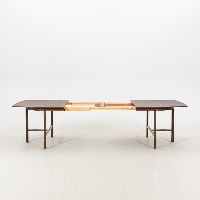 A table and four chairs in lacquered mahogany by David Rosén, "Triva-diné", middle of the 20th century.