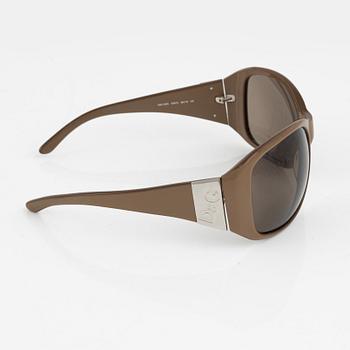 Dolce & Gabbana, a pair of beige sunglasses, 2007.