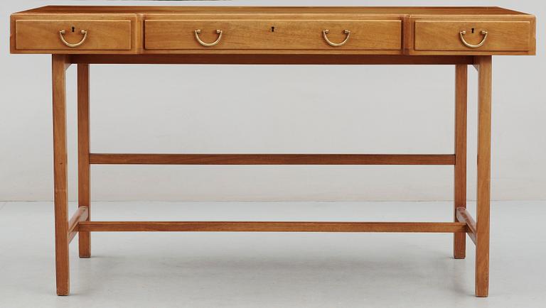 A Josef Frank mahogany and walnut desk by Svenskt Tenn.