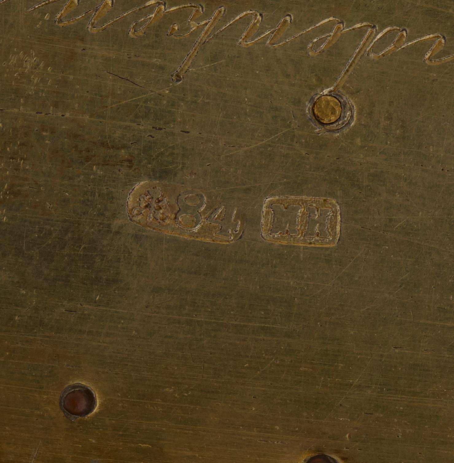 A CIGARRETTE Russian 19th century parcel gilt and enameld cigarette-case, makers mark of Michael Isakov, S.t Petersburg.