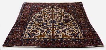 An Antique silk Keshan rug, Central Persia, c. 152 x 105 cm.