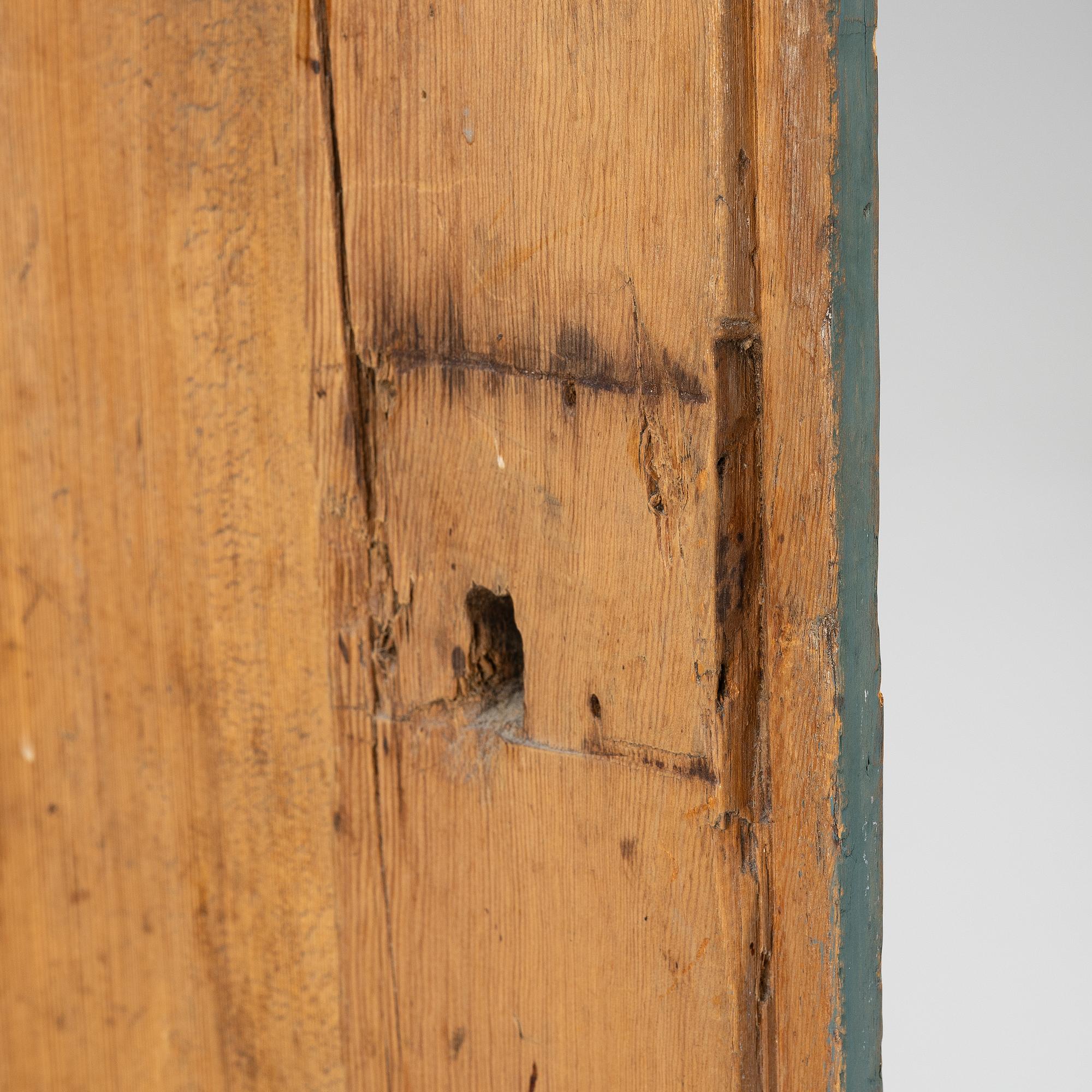 A Dalecarlian polychrome painted cabinet, dated 1798.