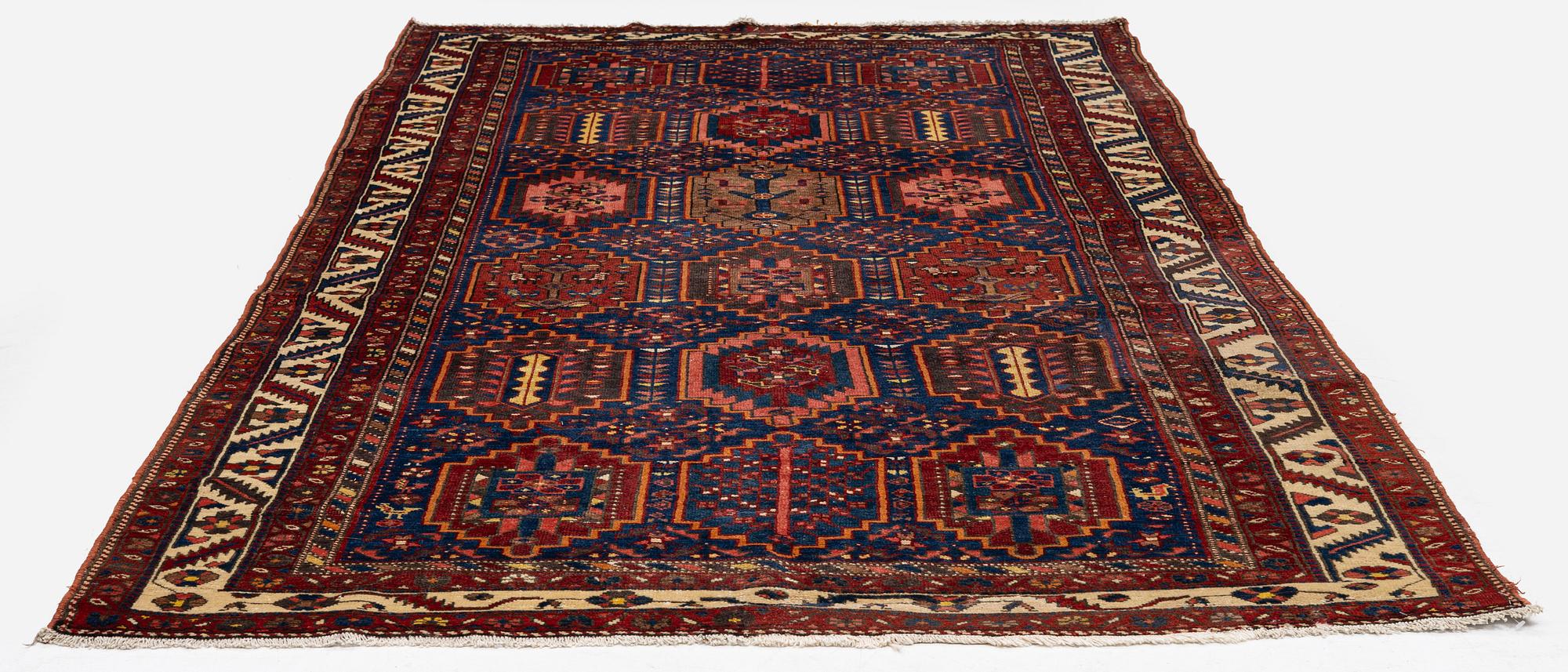 A semi-antique Baba Haydar carpet, Chahar Mahal and Bakhtiari region, West Persia, c. 297 x 156 cm.