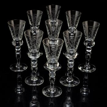 Nine 'Gustav III' aquavit glasses, from Reijmyre Glasbruk.