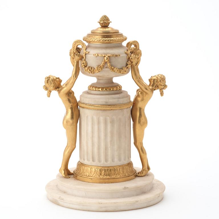 A Louis XVI ormolu and marble centrepiece "Monument Antique", possibly from the workshop of Pierre Gouthière.