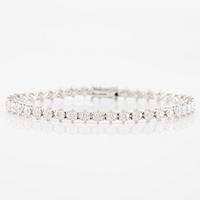 Tennis bracelet, 18K white gold with fancy-cut diamonds.