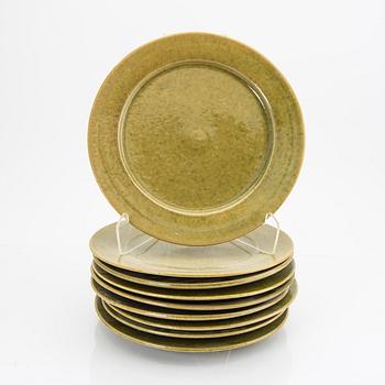 Signe Persson-Melin, a set of nine 1950s kopper glazed stoneware plates.