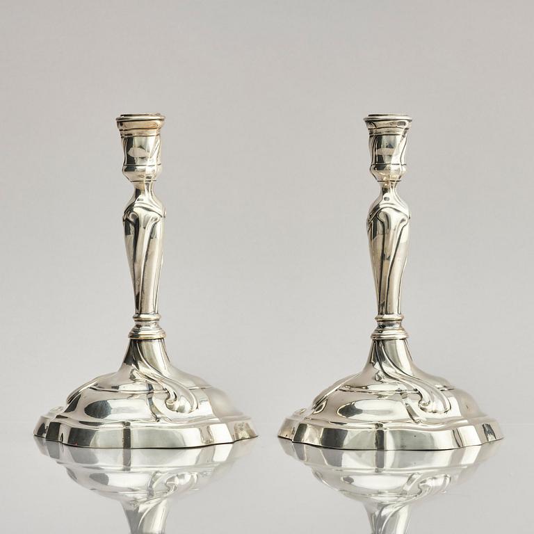 A pair of German silver Rococo candlesticks, marks of Johann Jacob Baur, Augsburg 1777-1779.