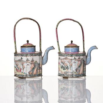 A Chinese pair of enamel on copper tea pots, Qing dynasty, Qianlong (1736-95).