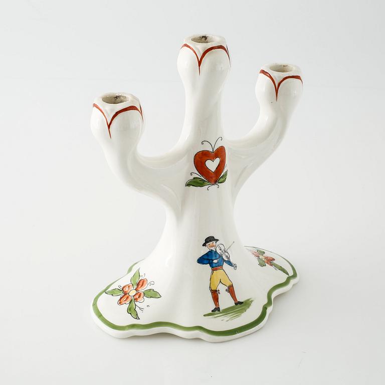 A candelabrum in ceramic named "Daldansen", Rörstrand, from early 20th century.