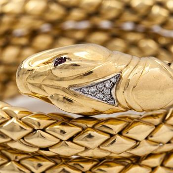 Chimento, An 18K gold snake bracelet with rubies and diamonds ca. 0.46 t in total. Italy.