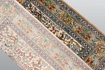 A pictoral oriental silk rug, 94 x 92 cm.