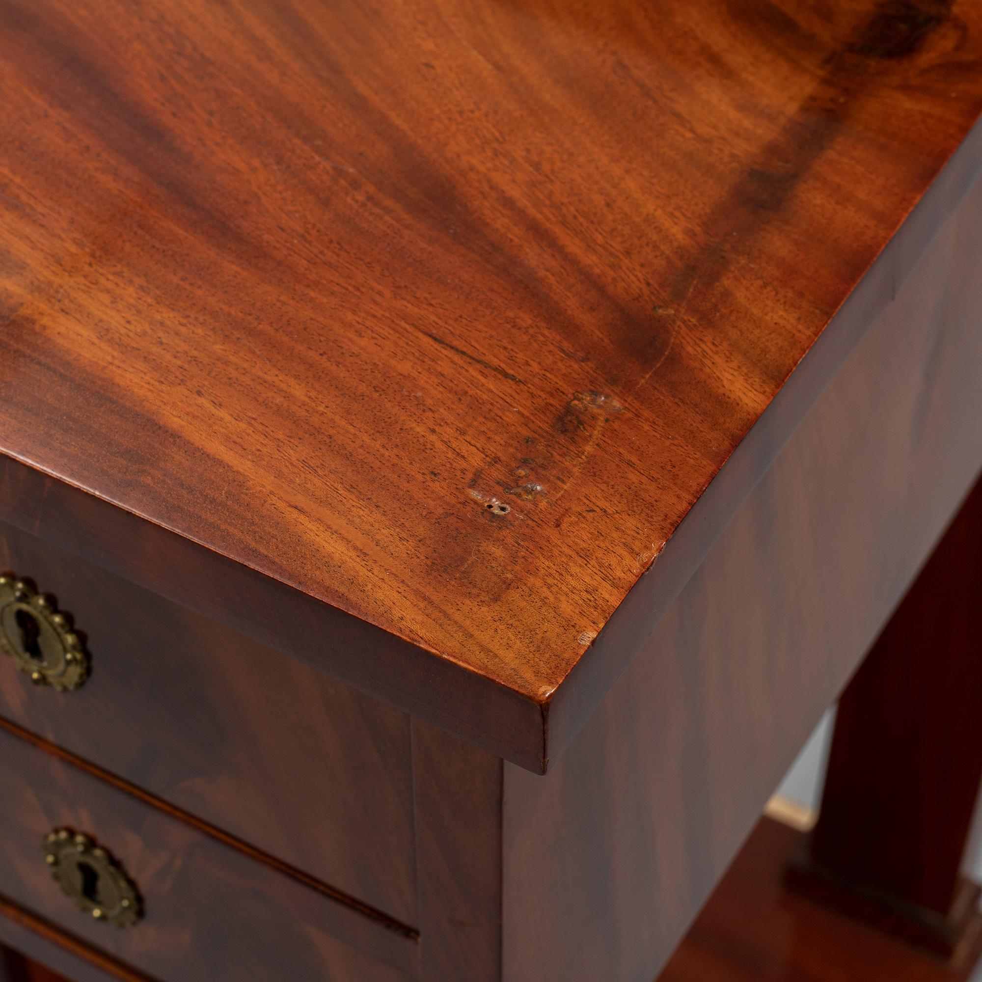 A mahogany console table, Stockholm, first half of the 19th century .