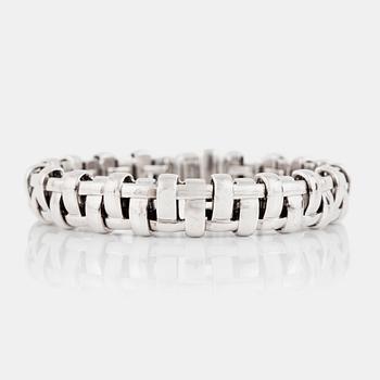 1302. A Tiffany & Co white gold basket weave bracelet.