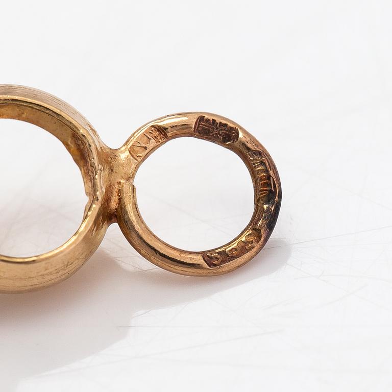 A 14K gold bracelet.
