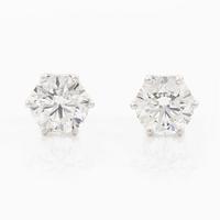 Earrings, single-stone earrings in 18K white gold with brilliant-cut diamonds, accompanied by IGI report.