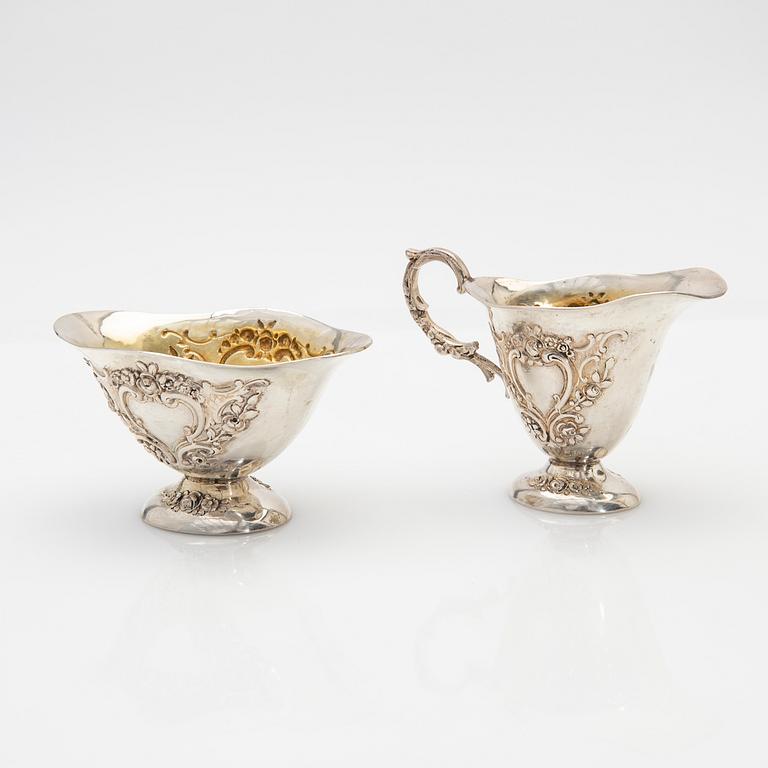 Cream jug and sugar bowl, silver, early 20th century.