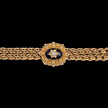A gold chain with black enamel, pearl and diamond. 19th century. Weight 67 g.