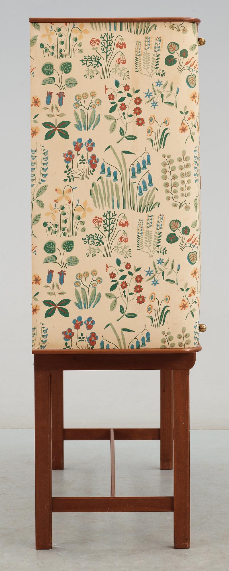 A Josef Frank mahogany cabinet, doors and sides covered in Frank's floral chintz fabric 'Fatima', Svenskt Tenn ca 1937.
