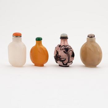 A group of four Chinese snuffbottles, 20th century.