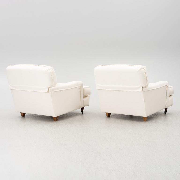 Vico Magistretti, a pair of 'Raffles' armchairs, De Padova, Italy, 21st century.