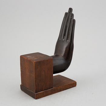 A bronze scultpure of a hand gesture, Thailand, 20th Century.