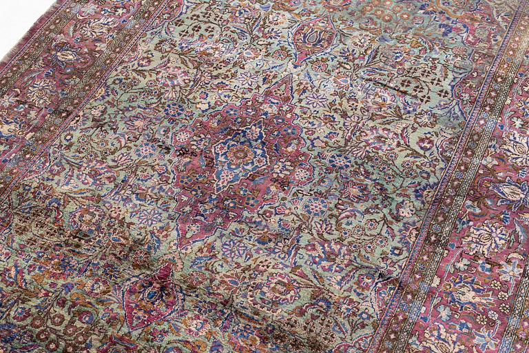 A rug, antique, silk Kashan, ca. 196 x 129 cm.