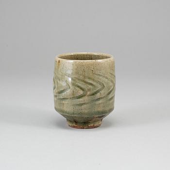 TATSUZŌ SHIMAOKA, a celadon glaze vase, signed.