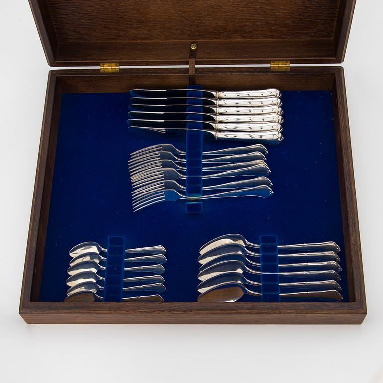 A 50-piece set of 'Chippendale' silver cutlery, Auran Kultaseppä, Turku 1989. In two original wooden boxes.