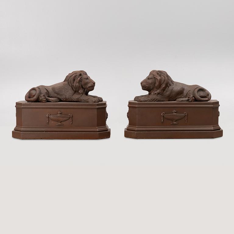 A pair of garden sculptures.