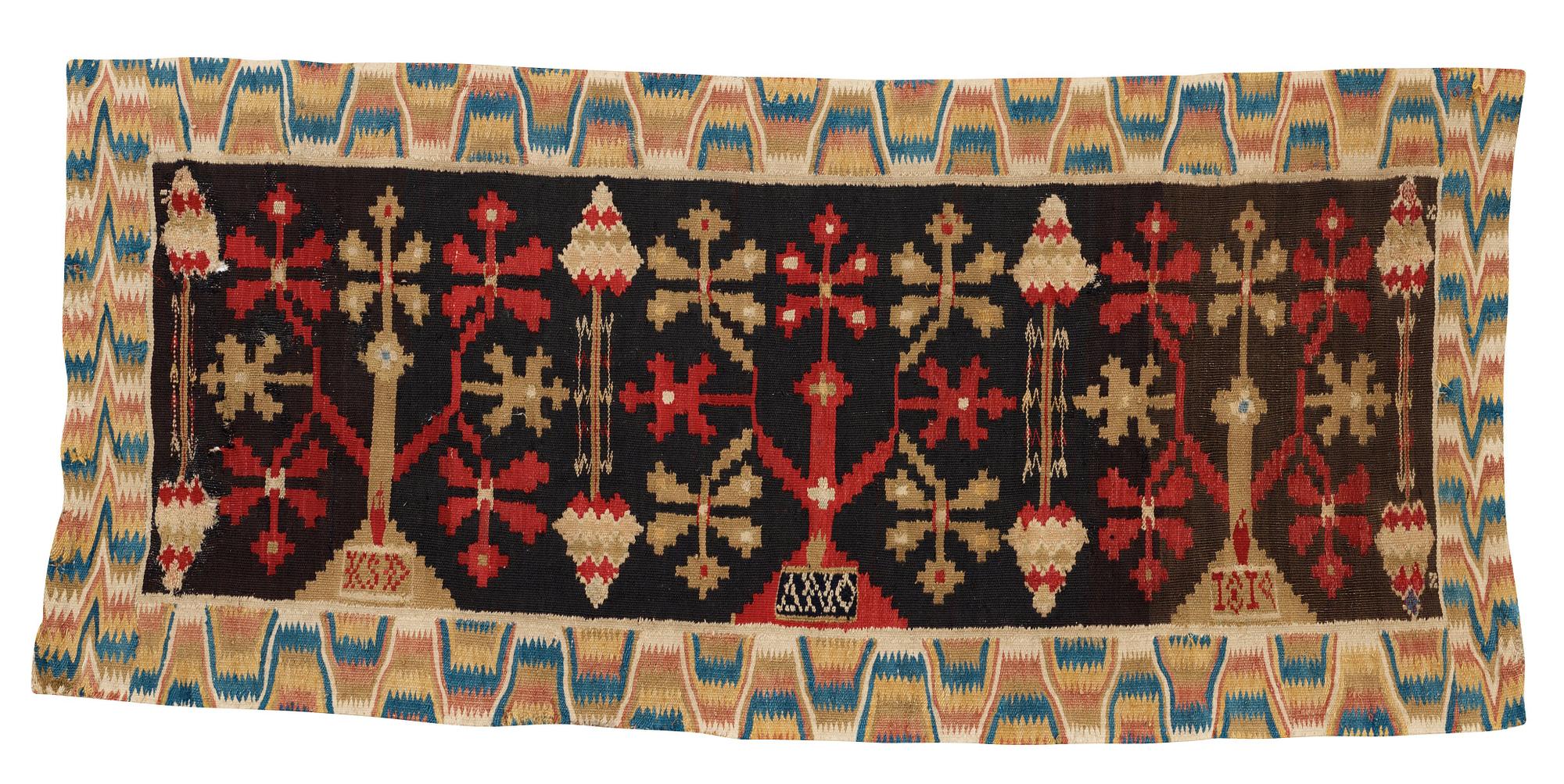 CARRIAGE CUSHION. Rölakan (flat weave). 51,5 x 114 cm. Skåne, Skytts härad (district), dated 1819.