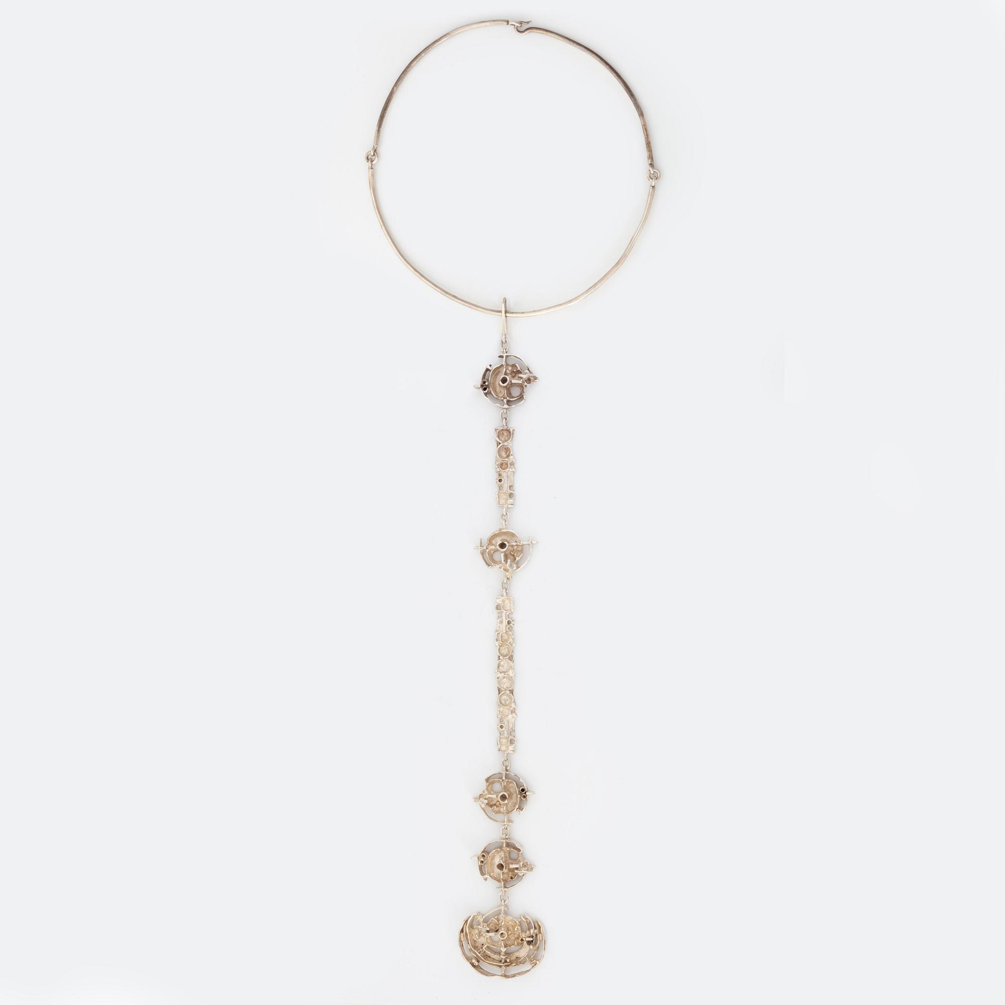 Juhls silver necklace.