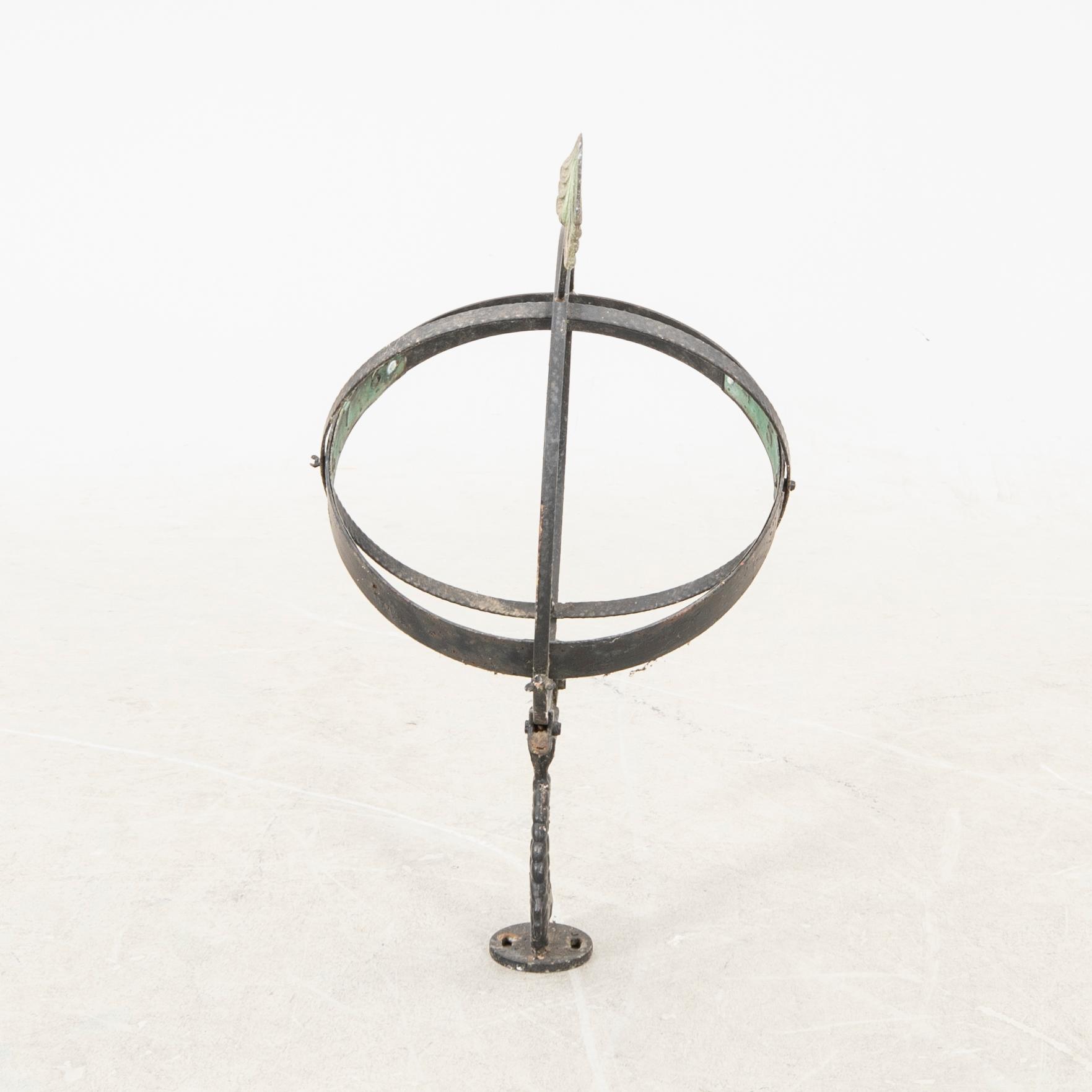 A mid 1900s copper sun dial.